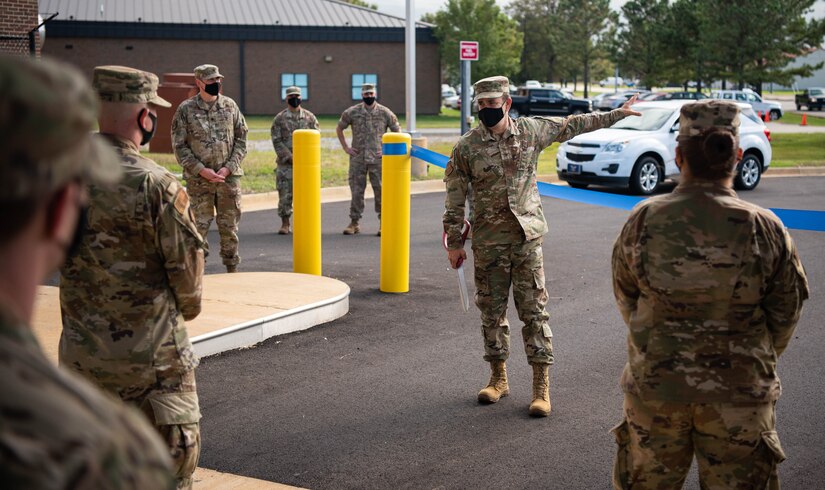 Col. Allen Herritage talks to members of the 633rd LRS fuels management team.