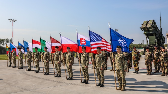 Soldiers from ten nations prepare static displays for closing ceremony of Tobruq Legacy 2020 at Siauliai Air Base, Lithuania. Tobruq Legacy is a biennial air defense exercise that looks to advance the capabilities of the US and its NATO Allies and partners in Eastern Europe, to train more cohesively and to enhance a unified command. Approximately 750 military personnel from 10 ally nations including Czech Republic, Estonia, France, Hungary, Italy, Latvia, Lithuania, Poland, and the United States participated in this exercise.