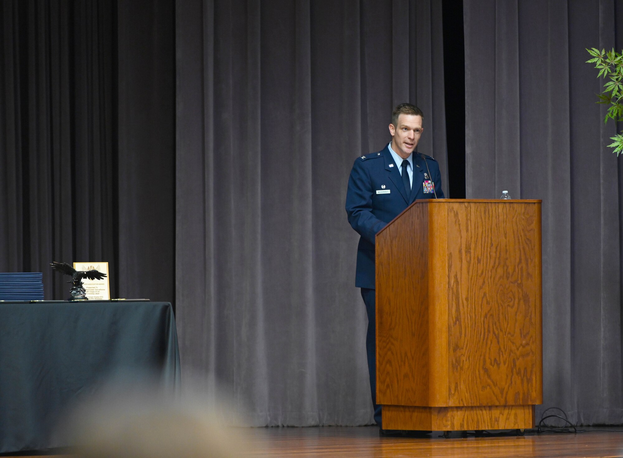 U.S. Air Force Col. Scott Wiederholt, 305th Air Mobility Wing commander, speaks to the Specialized Undergraduate Pilot Training class of 21-01 during their graduation ceremony Oct. 23, 2020, on Columbus Air Force Base, Miss. Wiederholt is a command pilot with over 4,400 hours in the C-17A, C-21A, T-1A, and T-37B, including 940 combat hours. (U.S. Air Force photo by Senior Airman Jake Jacobsen)