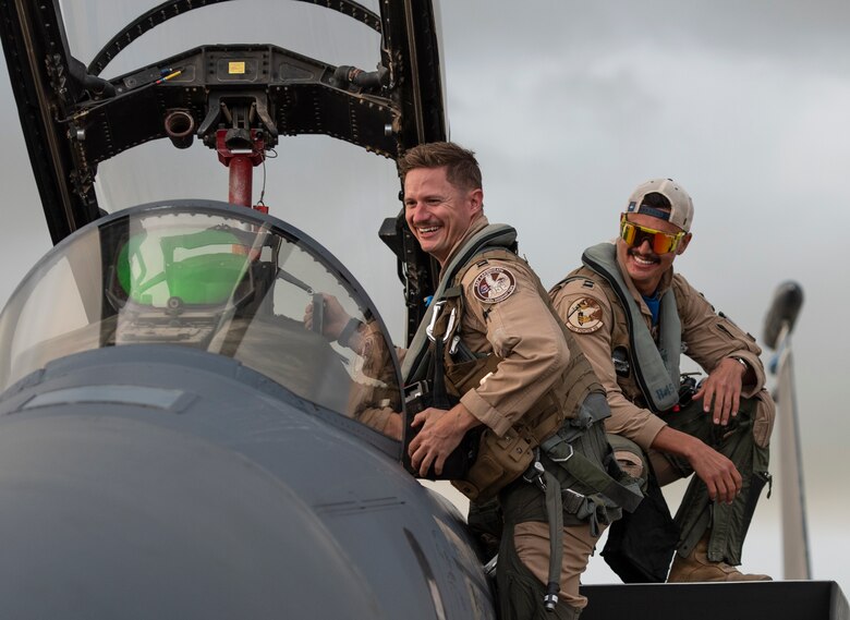 Aircrew assigned to the 492nd Fighter Squadron depart their aircraft to reunite with friends and family at Royal Air Force Lakenheath, England, Oct. 16, 2020. The 492nd FS returned from a six-month deployment in support of Operation Inherent Resolve. (U.S. Air Force photo by Airman 1st Class Jessi Monte)