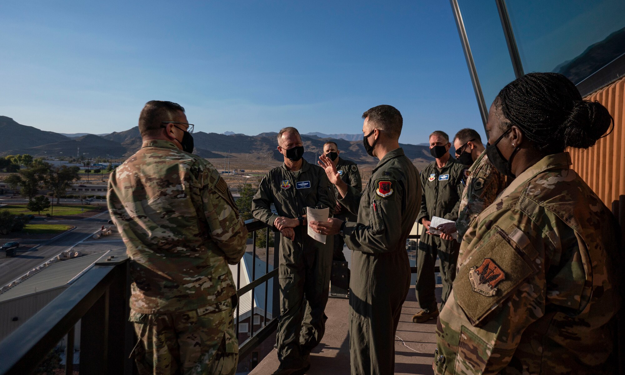 Col. Stephen Jones, 432nd Wing/432nd Air Expeditionary Wing commander, gives a canvas tour of the installation to Gen. Mark Kelly, from the top of the air traffic control tower.
