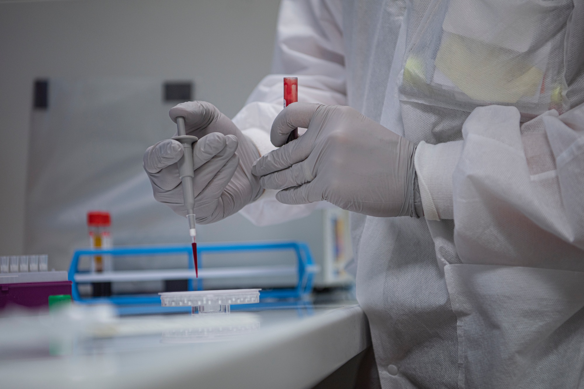 U.S. Air Force Senior Airman Moran Alexander-Luis, 86th Medical Support Squadron medical laboratory technician, transfers a blood sample from a vial at Ramstein Air Base, Germany, Oct. 15, 2020. Lab techs assigned to the 86th MDSS perform a variety of tests to include blood differentials, strep tests, pregnancy tests and urinalysis. (U.S. Air Force photo by Airman 1st Class Jennifer Gonzales)