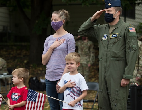 U.S. Air Force Maj. Brad Jordan renders a salute during the national anthem in in Falcon Heights, Minn., Sept. 26, 2020.