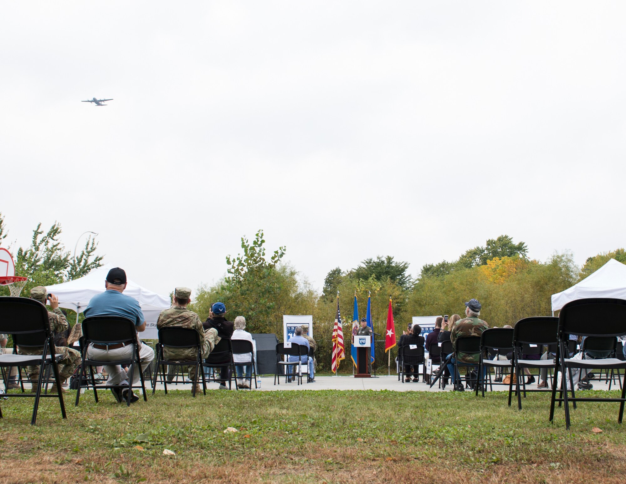 A C-130 Hercules from the 133rd Airlift Wing flies over a ceremony in Falcon Heights, Minn., Sept. 26, 2020.