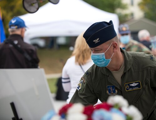 U.S. Air Force Col. Andy Burda, commander of the 133rd Maintenance Group, looks at historical items from the 109th Observation Squadron in Falcon Heights, Minn., Sept. 26, 2020.