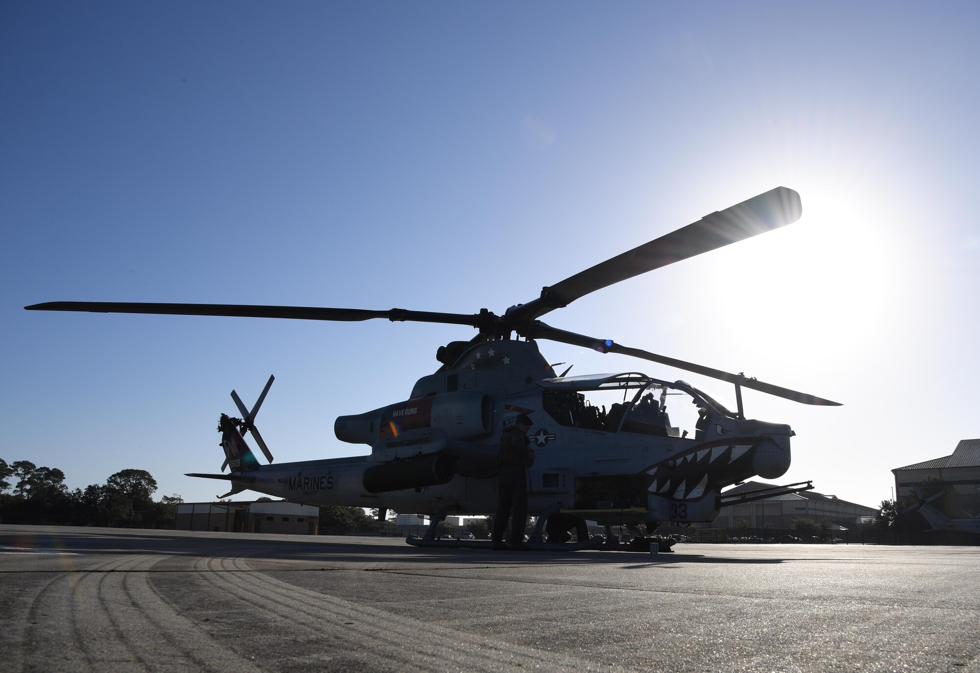 An AH-1Z Cobra from the Marine Light Attack Helicopter Squadron 167, Marine Corps Air Station New River, North Carolina, is on displayed on the flightline at Keesler Air Force Base, Mississippi, Oct. 21, 2020. Two AH-1Z Cobras and two UH-1Y Hueys were at Keesler for joint training with the Marine Special Operations Command during their RAVEN exercise from Oct. 12-21. RAVEN is the exercise Marine Raiders complete after their six-month training cycle in preparation for deployment to ensure operational readiness of the Marine Special Operations Teams. (U.S. Air Force photo by Kemberly Groue)