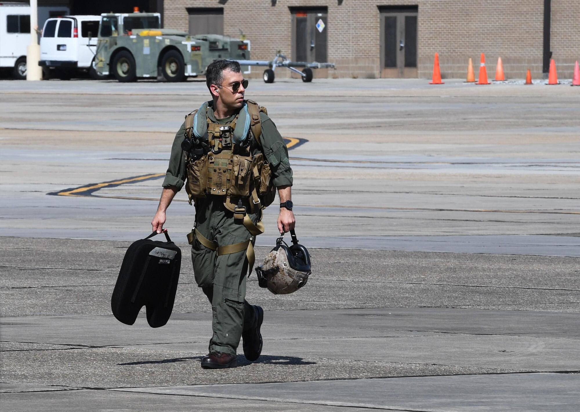 U.S. Marine Corps Maj. Patrick Testa, Marine Medium Tiltrotor Squadron 774 pilot, Naval Air Station Norfolk, Virginia, walks off the flightline after piloting a MV-22B Osprey at Keesler Air Force Base, Mississippi, Oct. 23, 2020. Marines came to Keesler to conduct routine training operations in and around the Mississippi area. (U.S. Air Force photo by Kemberly Groue)