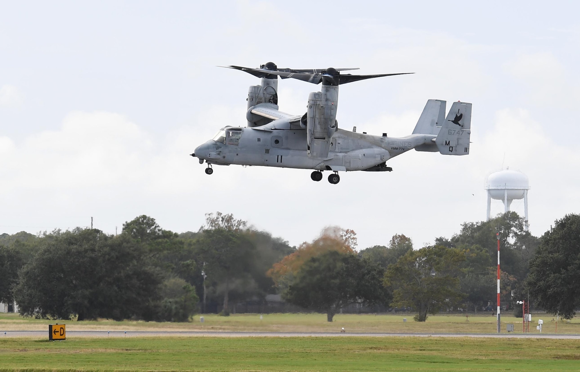 A MV-22B Osprey from the Marine Medium Tiltrotor Squadron 774, Naval Air Station Norfolk, Virginia, prepares to land on the flightline at Keesler Air Force Base, Mississippi, Oct. 23, 2020. Marines came to Keesler to conduct routine training operations in and around the Mississippi area. (U.S. Air Force photo by Kemberly Groue)