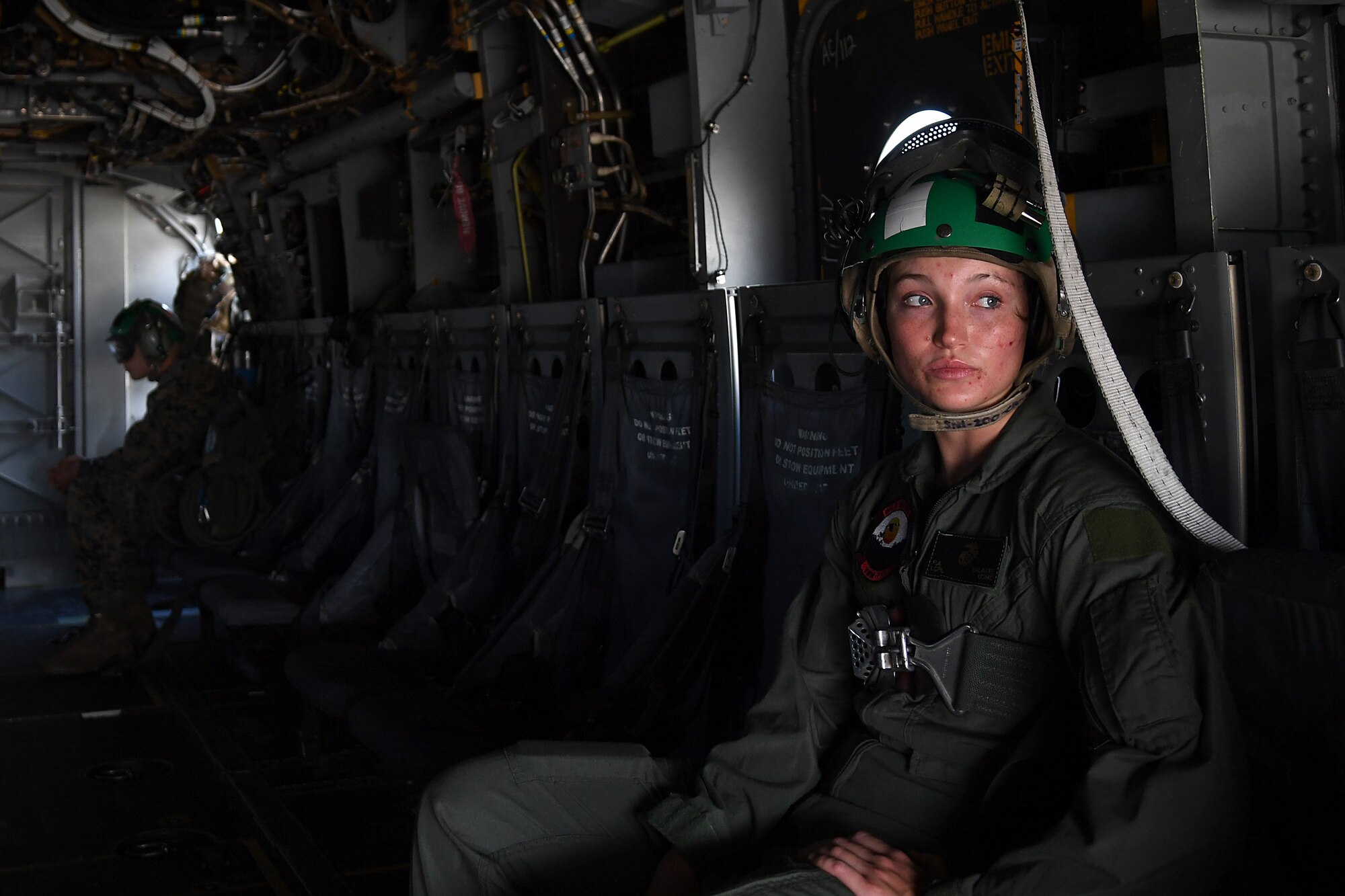 U.S. Marine Corps Lance Cpl. Porsha Delatte, Marine Medium Tiltrotor Squadron 774 avionics technician, Naval Air Station Norfolk, Virginia, sits inside an MV-22B Osprey at Keesler Air Force Base, Mississippi, Oct. 23, 2020. Marines came to Keesler to conduct routine training operations in and around the Mississippi area. (U.S. Air Force photo by Senior Airman Suzie Plotnikov)