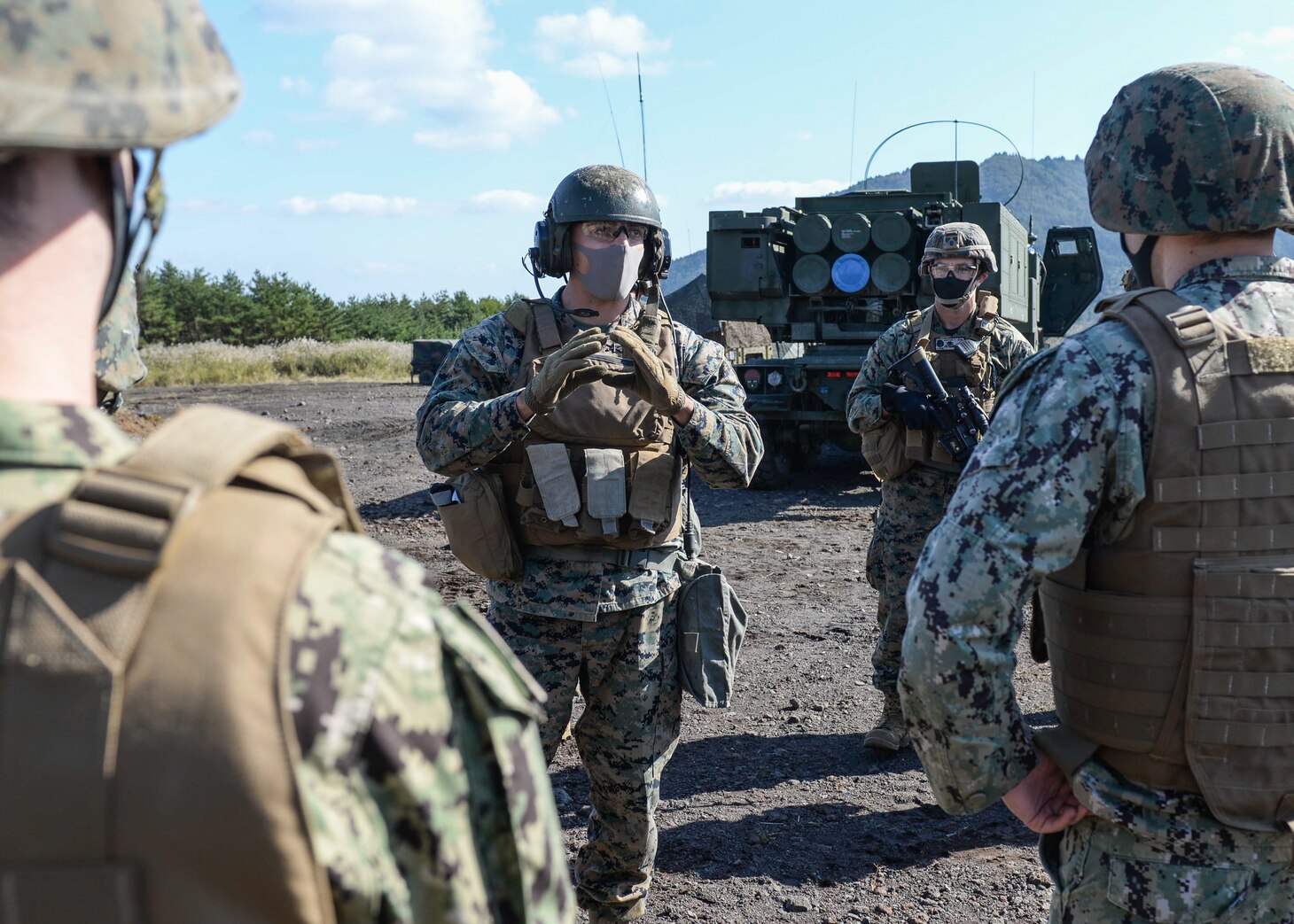 CAMP FUJI, Japan (Oct. 21, 2020) - Marines with 3rd Battalion, 12th Marine Regiment demonstrate to members of 7th Fleet staff the readiness of an M142 high mobility artillery rocket system launcher during Artillery Relocation Training Program 20.3 at Combined Arms Training Center, Camp Fuji. 7th Fleet serves with III MEF to continually execute missions that enable maritime superiority through effective command and control, prosecution of naval fires, and operational maneuvers.