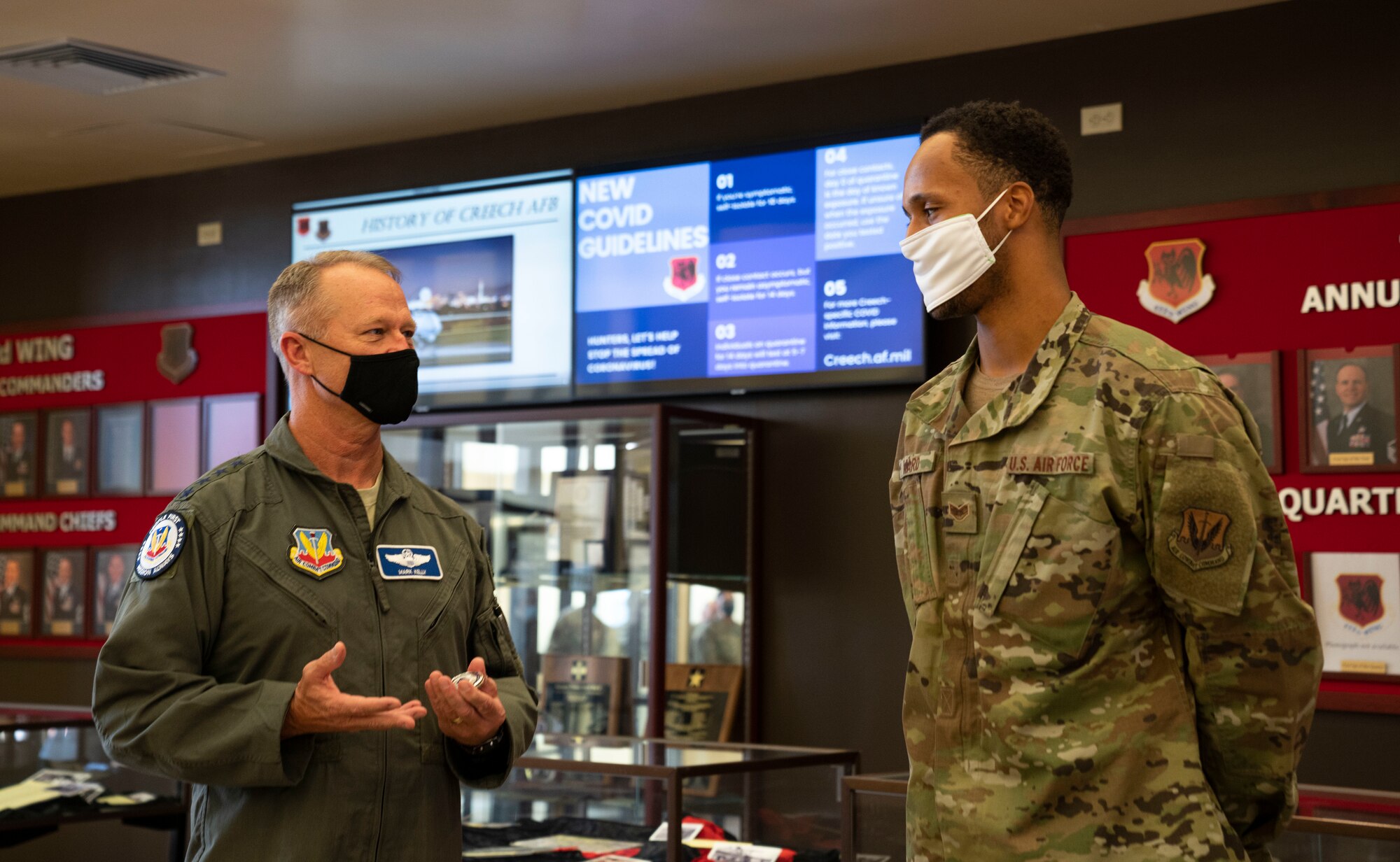 Gen. Mark Kelly speaks to an Airmen in the wing headquarters building of Creech Air Force Base.