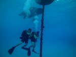 Official U.S. Navy file photo of Seabee underwater construction divers deployed from Task Force 75.