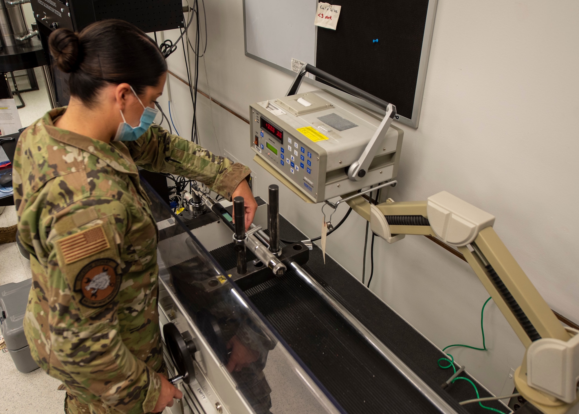 Airman 1st Class Nikki Silvestri, 4th Component Maintenance Squadron physical dimensional technician, calibrates a digital torque wrench using a CDI multi torque station at Seymour Johnson Air Force Base, North Carolina, Oct. 19, 2020.