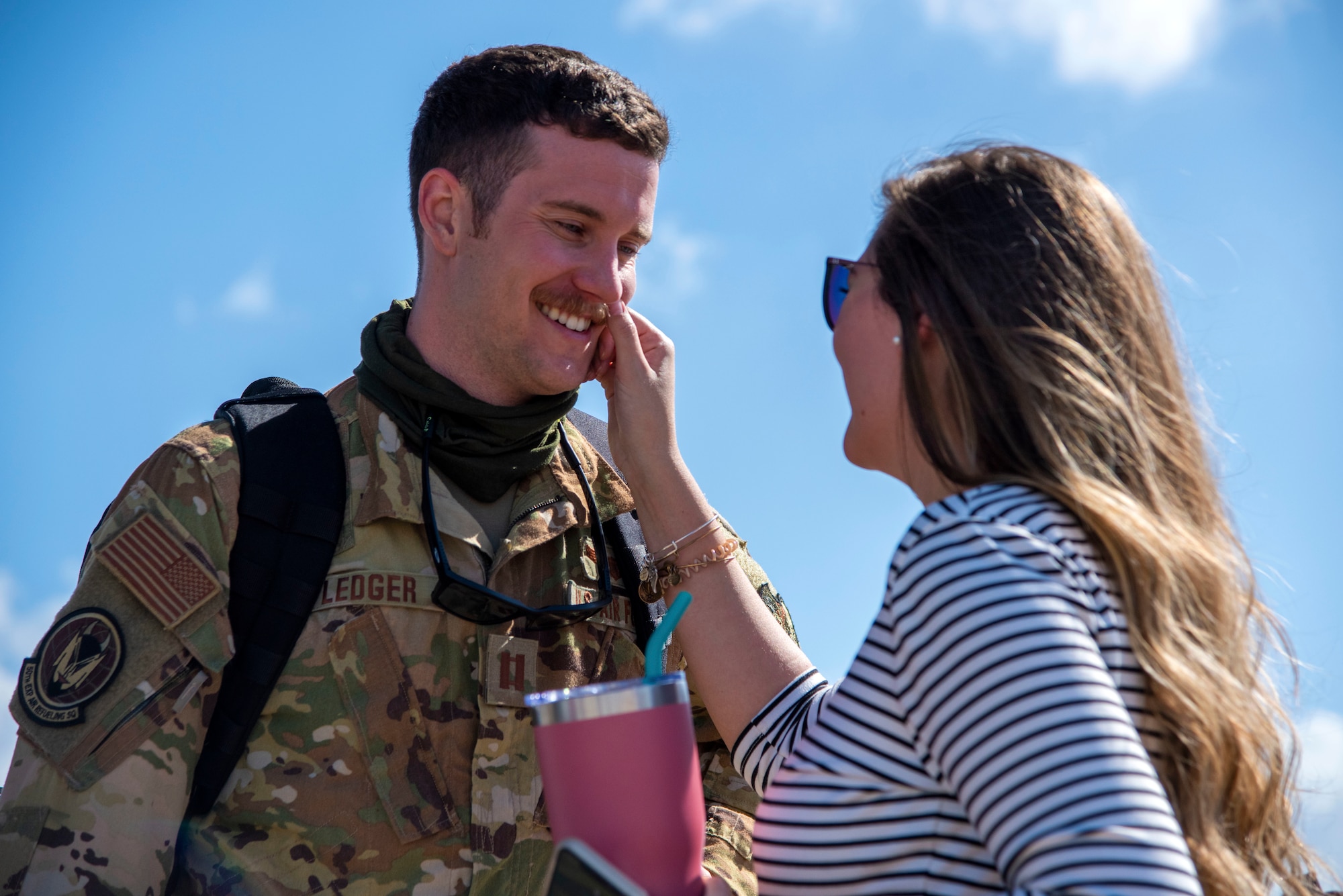 U.S. Air Force Capt. Travis Ledger, a 50th Air Refueling Squadron safety officer, sees his wife for first time in two-months at MacDill Air Force Base, Florida, Oct. 18, 2020.