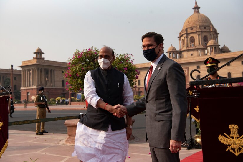 Defense Secretary Dr. Mark T. Esper shakes hands with Indian Defense Minister Rajnath Singh.