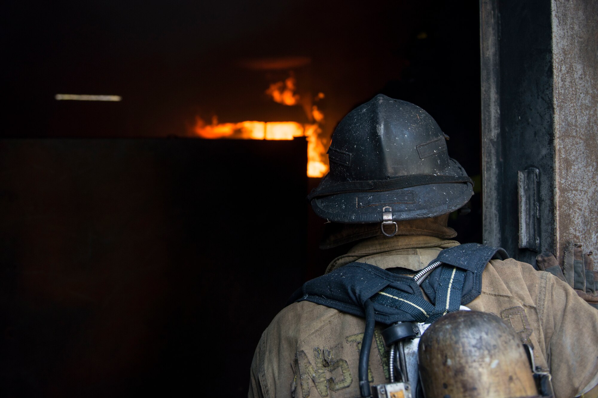 Connecticut National Guard firefighters conduct structural live fire training at the Connecticut Fire Academy, September 11, 2020 in Windsor Locks, Connecticut. The training was preceded by a ceremony that was held in honor of firefighters who lost their lives on the day of the September 11 terrorist attacks. (U.S. Air National Guard photo by Tech. Sgt. Tamara R. Dabney)