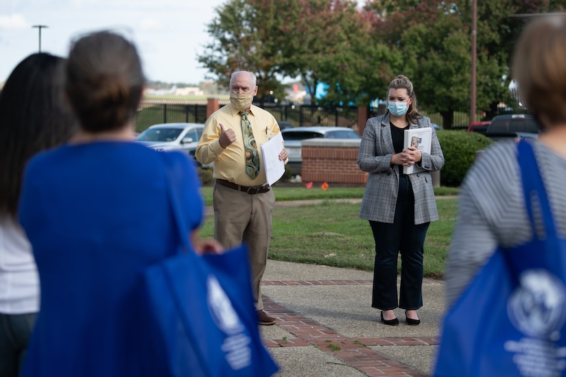 Robert Spiers, 89th Airlift Wing historian, leads a lecture on the historical significance of the PAX Terminal during Joint Base Andrews’ first “Windshield Tour,” a quarterly-held event hosted by the Military and Family Support Center that involved a tour bus of military spouses being introduced to historical attractions on the base, Oct. 23, 2020.