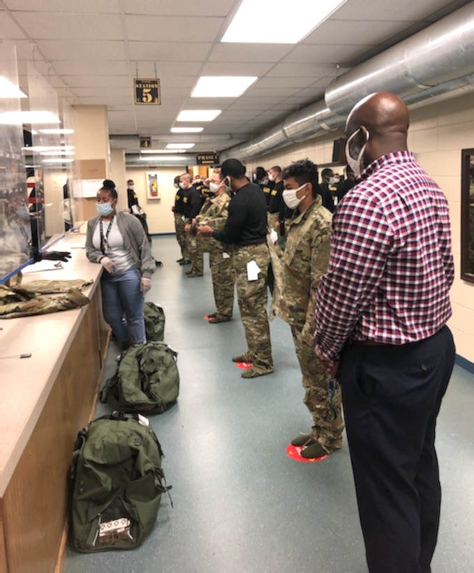 Recruits at the Army recruit training center in Fort Jackson, South Carolina receive improved hot weather combat uniforms during initial issuance for the first time Oct. 2, 2020. DLA Troop Support’s Clothing and Textiles supply chain provided about 10,000 sets of improved hot-weather combat uniform, or IHWCU, coats and trousers to recruit training centers across the country by Oct. 21, 2020.