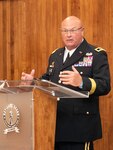 Maj. Gen. Michael Zerbonia, of Chatham, Illinois, Assistant Adjutant General-Army and Commander, Illinois Army National Guard, offers advice to the newly commissioned second lieutenants during the Illinois Army National Guard Officer Candidate School Commissioning ceremony Aug. 23 at the Illinois Military Academy, Camp Lincoln, Springfield, Illinois.