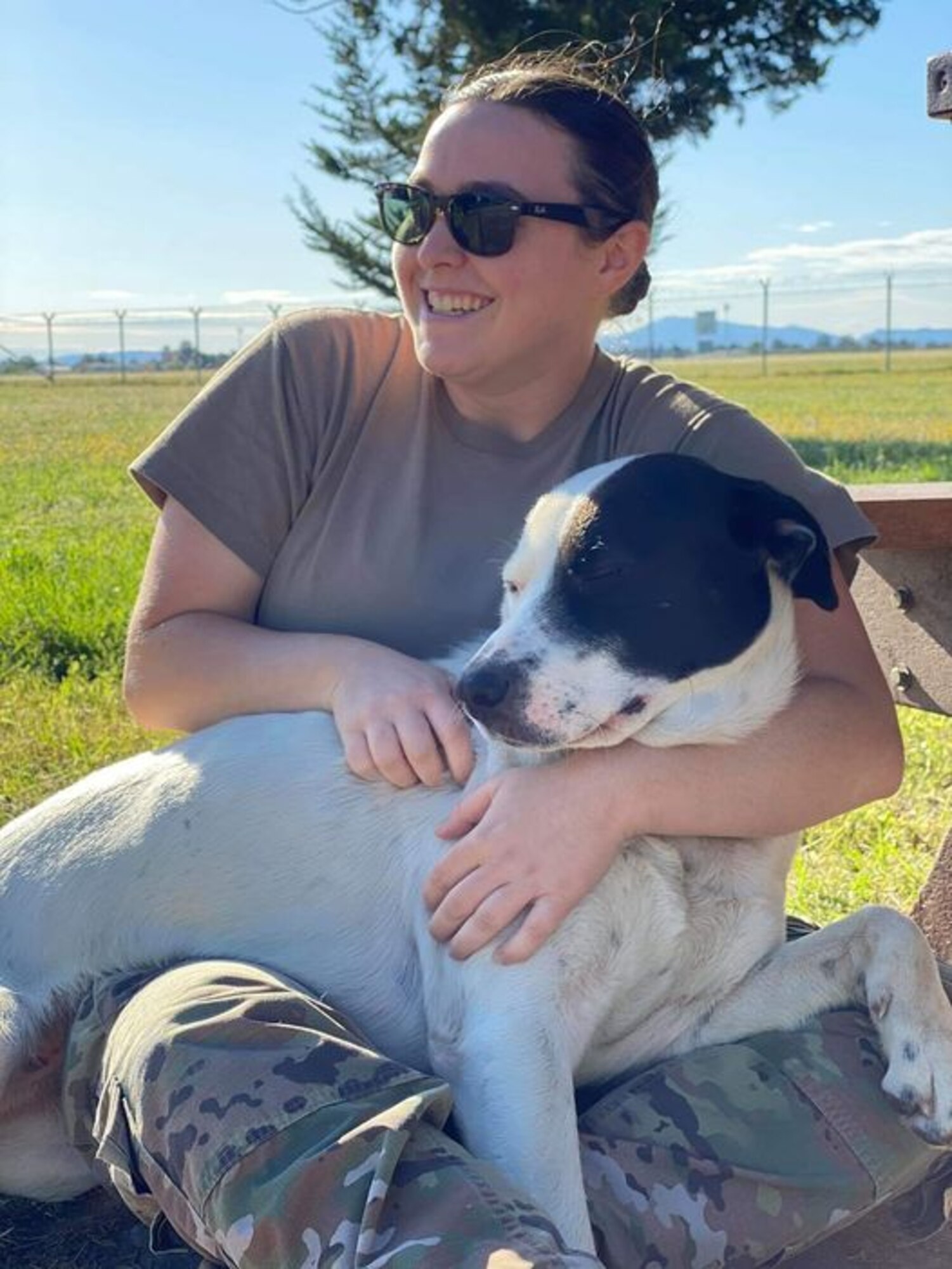 Puppy Rescue Mission uses social media platforms to support and receive donations for future pets like Carl and others. These deployers express emotion they feel for this canines who are about to be adopted. (Courtesy photo by PRM Facebook page).