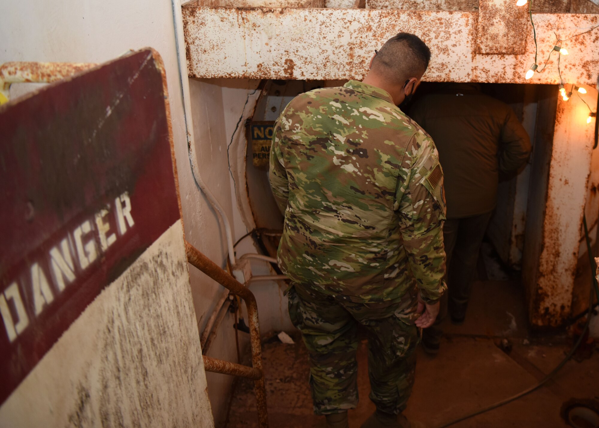 A member of Goodfellow enters the access tunnel to the Atlas missile silo at the Lawn Atlas Missile Base in Lawn, Texas, Oct. 26, 2020. Members were given a guided tour of the Cold War-era site. (U.S. Air Force photo by Airman 1st Class Ethan Sherwood)