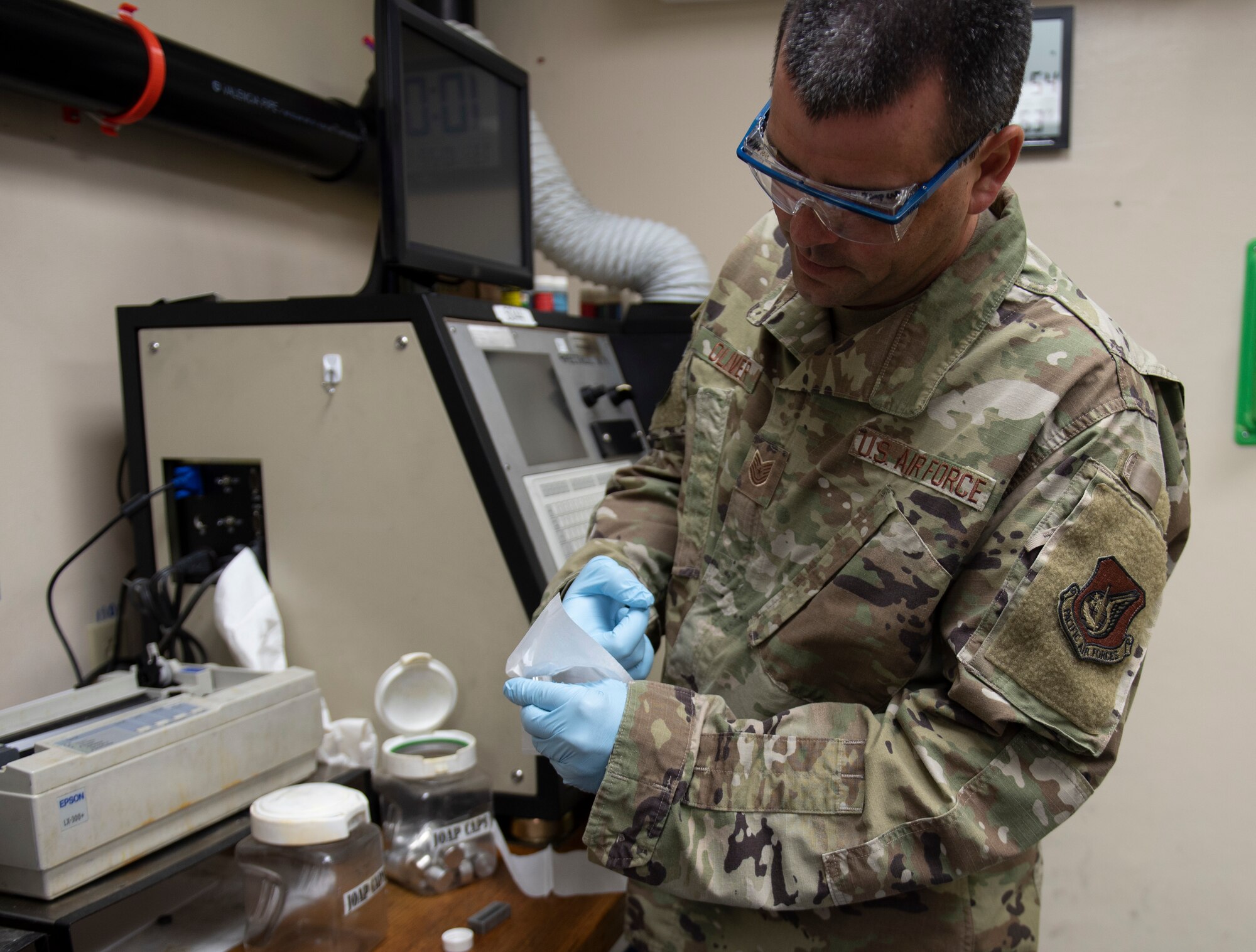 Tech. Sgt. Patrick Oliver, noncommissioned officer in charge of non-destructive inspections assigned to the 36th Maintenance Squadron demonstrates how easily his prototype is to clean Oct. 22, 2020, at Andersen Air Force Base, Guam.