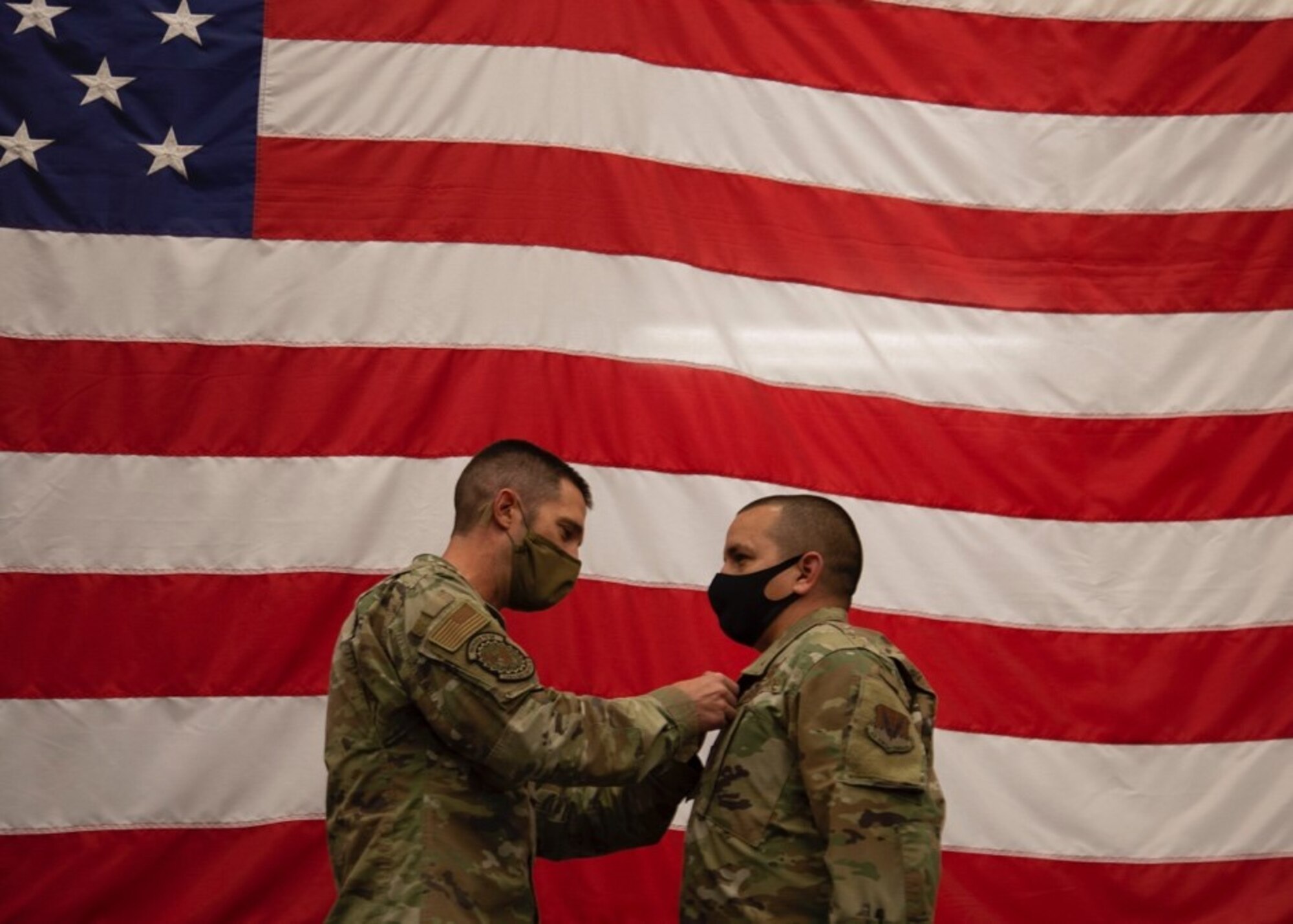 U.S. Air Force Lt. Col. Kevin Fletcher, 726th Air Control Squadron commander, pins the Bronze Star Medal onto Master Sgt. Joe Rodriguez, 726th Air Control Squadron radio frequency transmissions systems NCOIC, at Mountain Home Air Force Base, Idaho, Oct. 9, 2020. Along with the Bronze Star, Rodriquez was also awarded U.S. Army commendation medal for his participation in Operation Inherent Resolve. (U.S. Air Force Photo by Airman 1st Class Eric Brown)