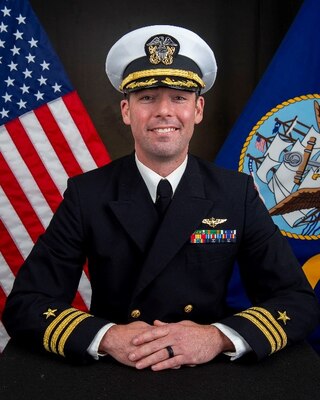 Official biography photo of Commander Timothy E. Rogers, XO, HSM-51.