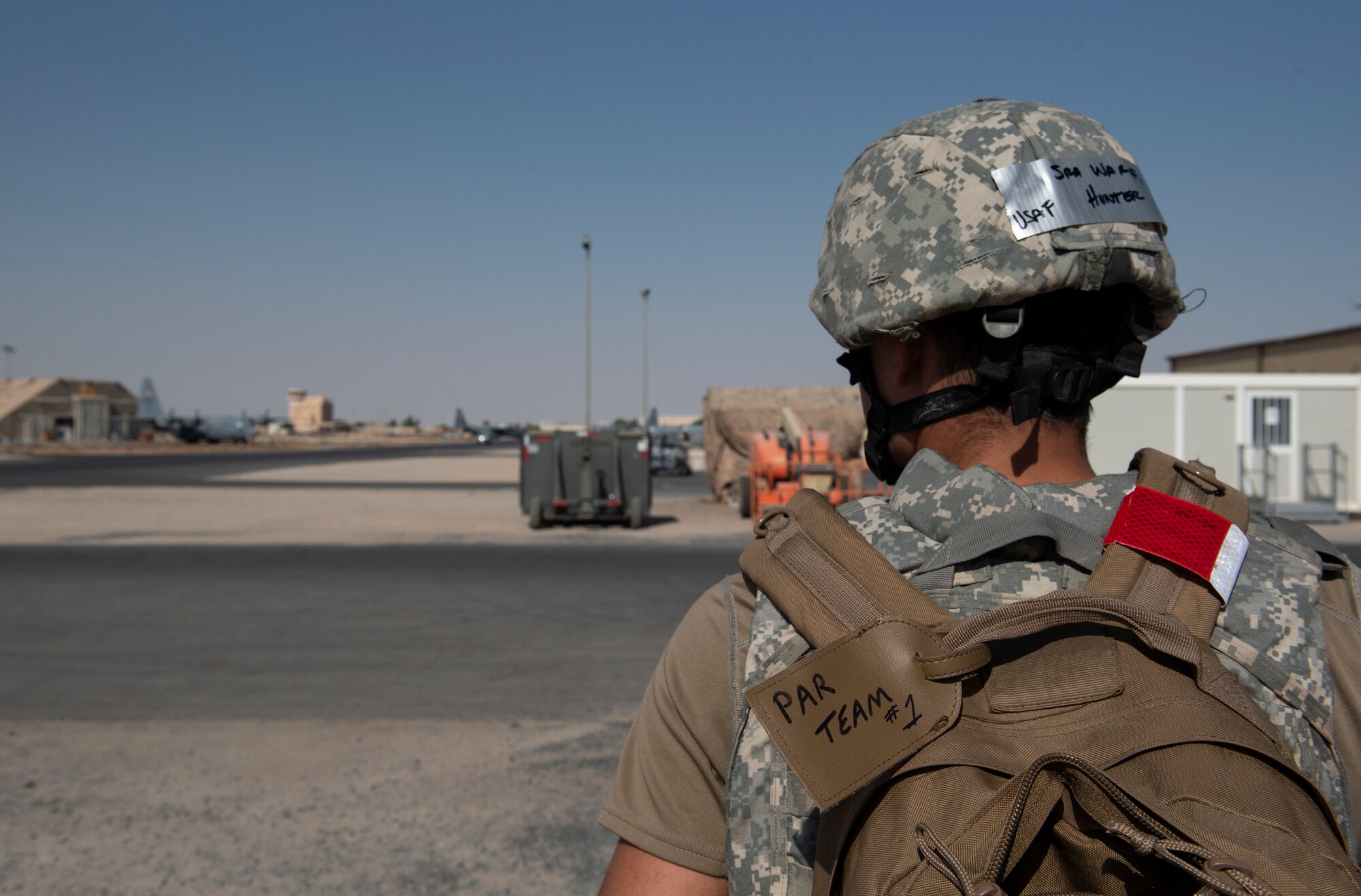 U.S. Air Force Senior Airman Hunter Ware, 5th Expeditionary Aircraft Maintenance Squadron C-17 Globemaster III aircraft integrated flight control systems technician, scans the area for simulated unexploded ordnances during Exercise Nodal Lightning 20-2