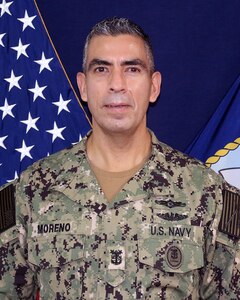 Official portrait of Master Chief Sergio H. Moreno, command master chief, Naval Computer and Telecommunications Station (NCTS) Bahrain.