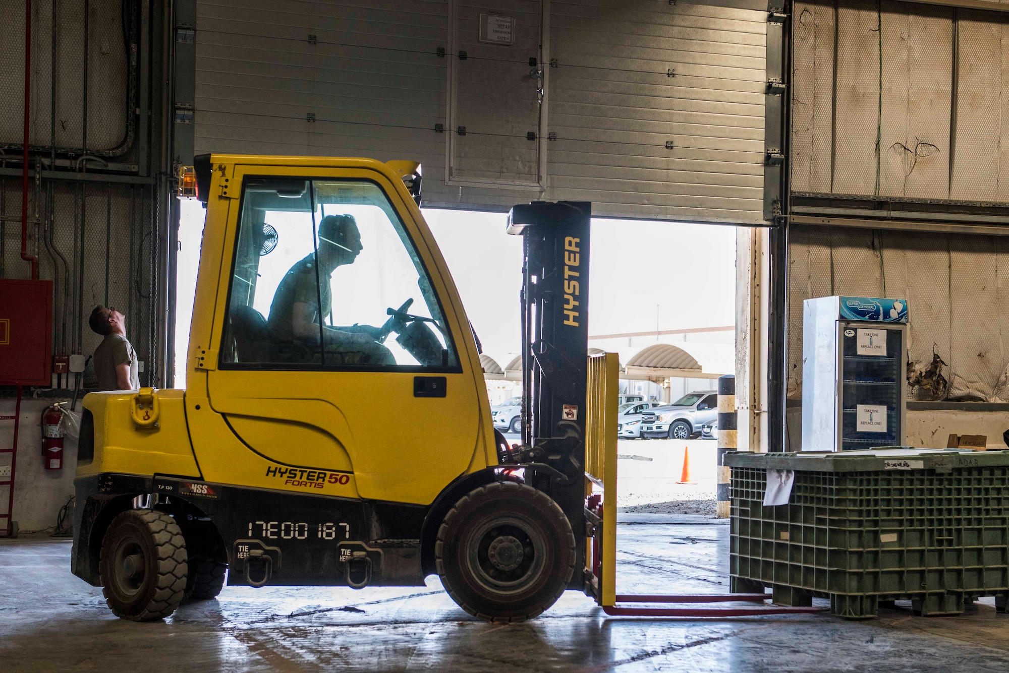 U.S. Air Force Senior Airman Collin Leger, 380th Expeditionary Logistics Readiness Squadron materiel management specialist, uses a forklift to relocate a crate at the individual protective equipment (IPE) warehouse on Al Dhafra Air Base, United Arab Emirates, Oct. 27, 2020.