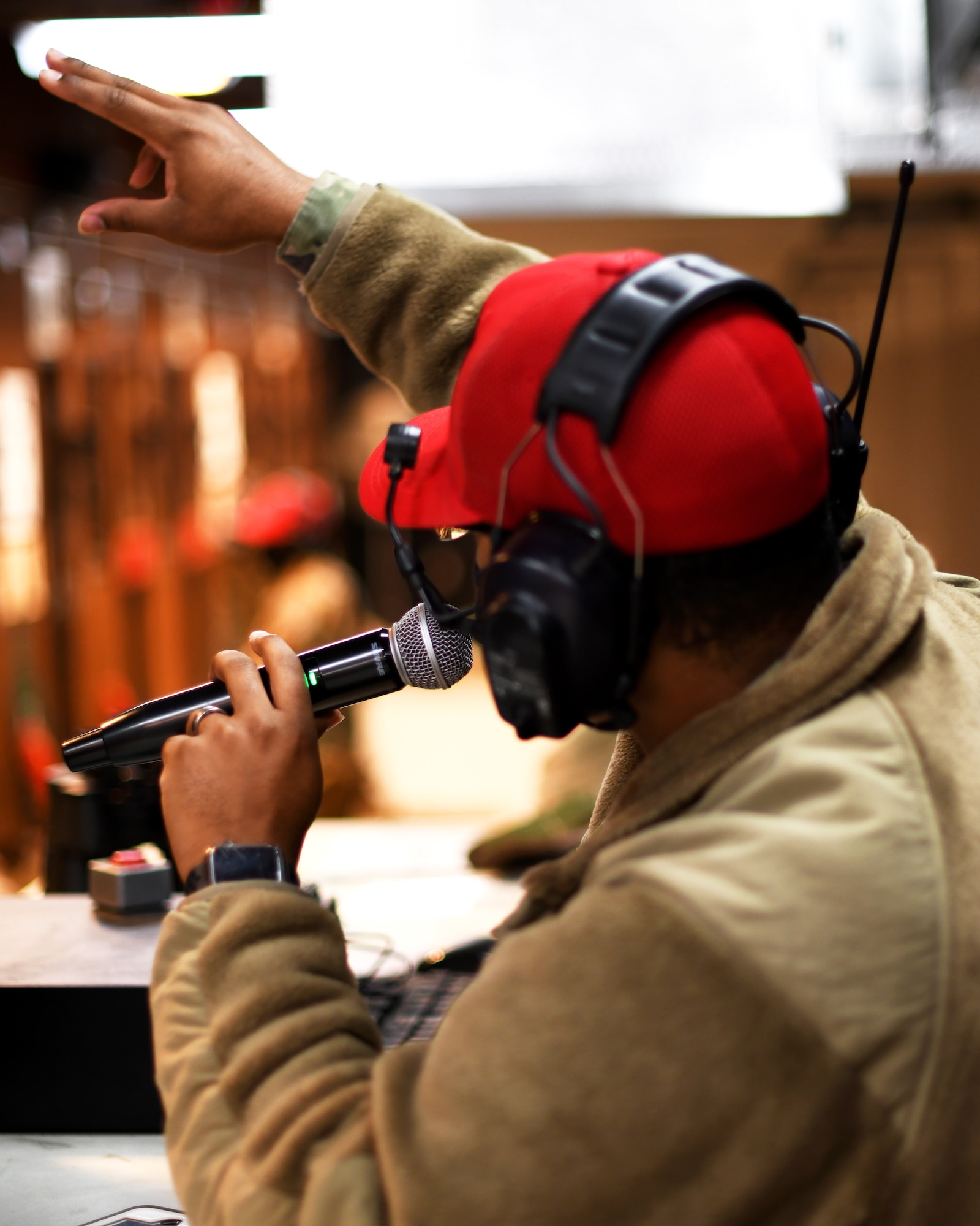 Tech. Sgt. Alonzo Clark, 319th Security Forces Squadron combat arms instructor briefs University of North Dakota Army Reserve Officer Training Corps cadets during weapons familiarization training on Grand Forks Air Force Base, N.D., Oct. 24, 2020.  The 319th SFS supplied the cadets with ammunition and indoor range access while the primary ROTC firing rage on Camp Grafton undergoes maintenance. (U.S. Air Force photo by Staff Sgt. Patrick A. Wyatt)