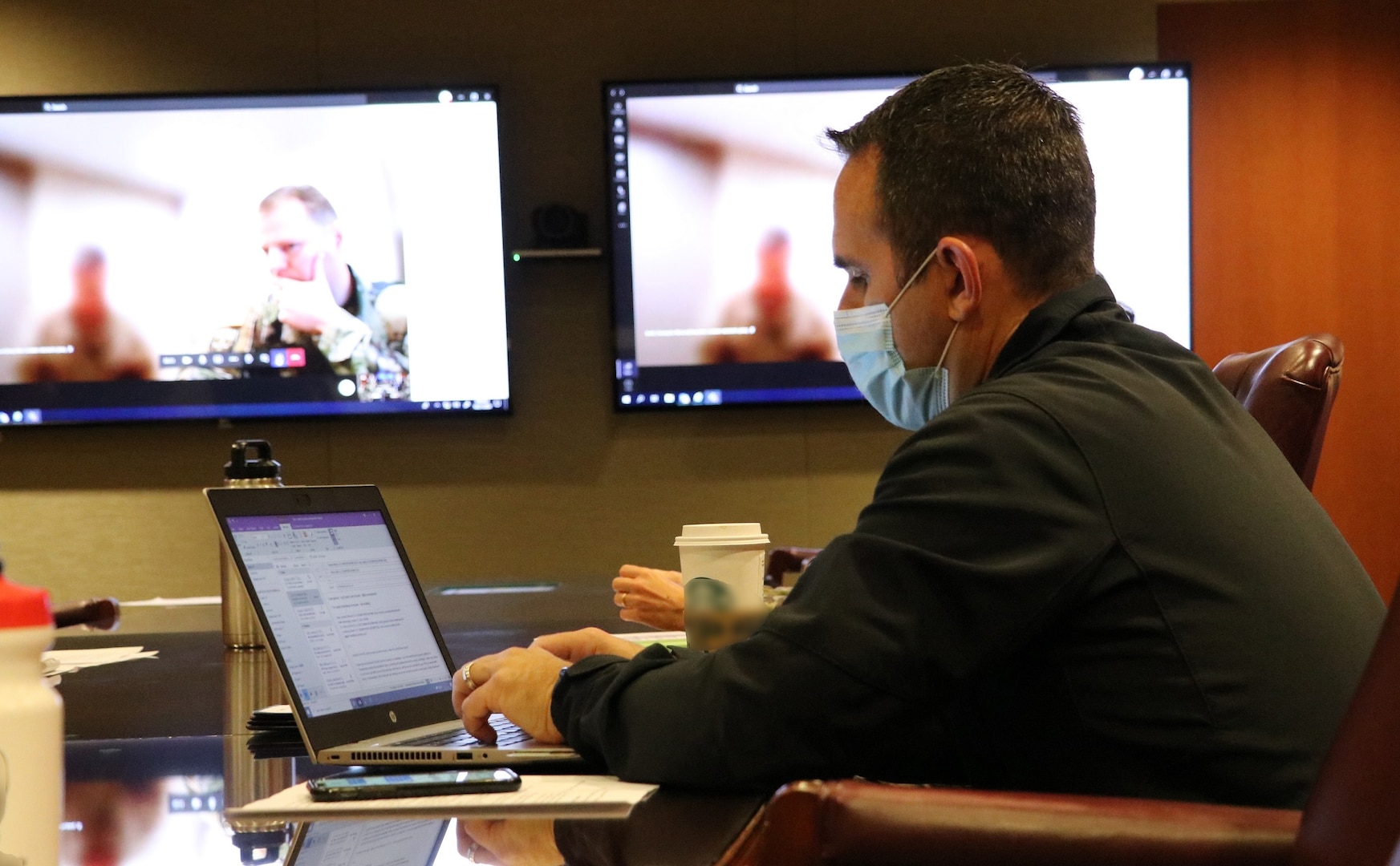 U.S. Air Force Col. Patrick Osborn, Deputy Commander for Surgical Services, Brooke Army Medical Center, prepares to answer COVID-19 questions during a video teleconference with Argentine Army doctors Oct. 21.