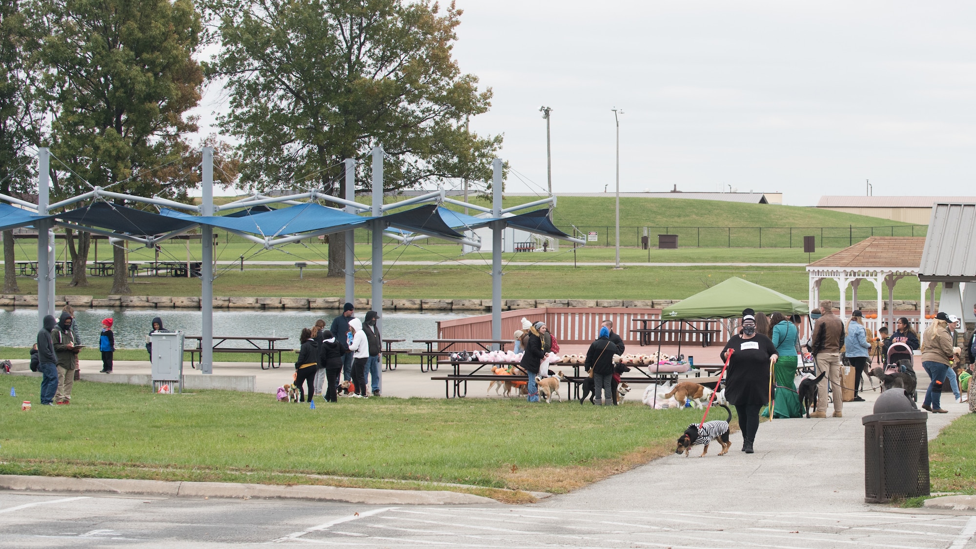 Members of Team Whiteman and their dogs participate in various activities during the Bark in the Park at the Ike Skelton Lake.