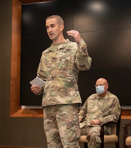 Newly promoted Col. Kevin G. Little, of Franklin, Illinois, addresses friends and family during his promotion ceremony at the Illinois Military Academy, Camp Lincoln, Springfield, Illinois Oct. 15.