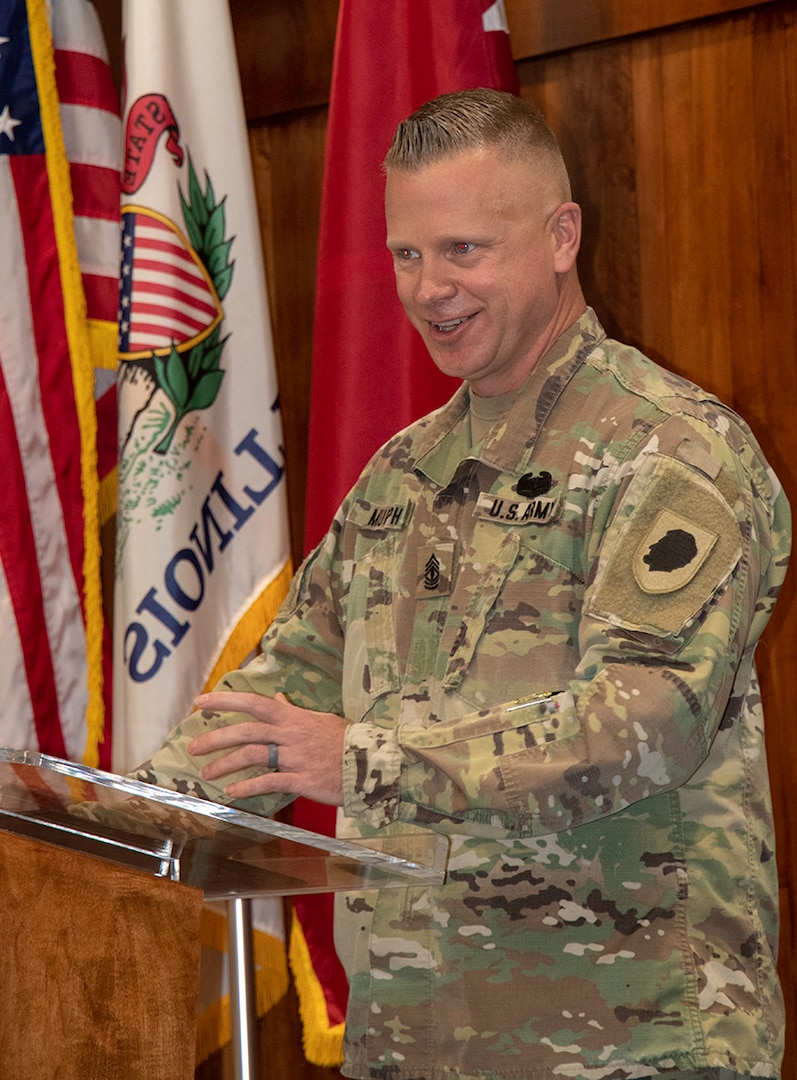 Illinois Army National Guard 1st Sgt. Clint Murphy, of Athens, Illinois, Company C, 634th Brigade Support Battalion, based in Springfield, Illinois, thanks friends and family during his pinning ceremony Oct. 23 at the Illinois Military Academy, Camp Lincoln, Springfield, Illinois.