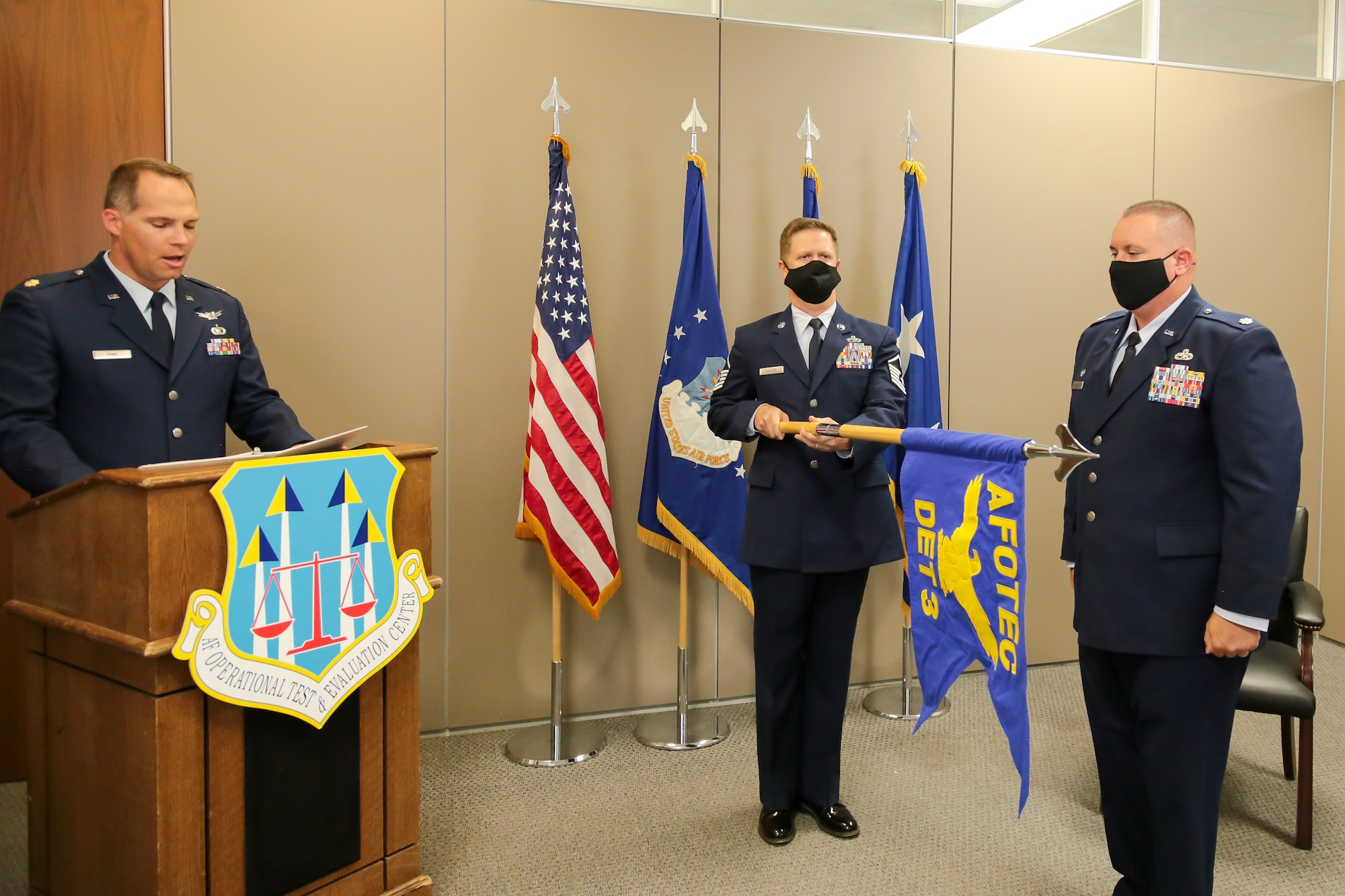 The Air Force Operational Test and Evaluation Center Detachment 3 guidon is presented.