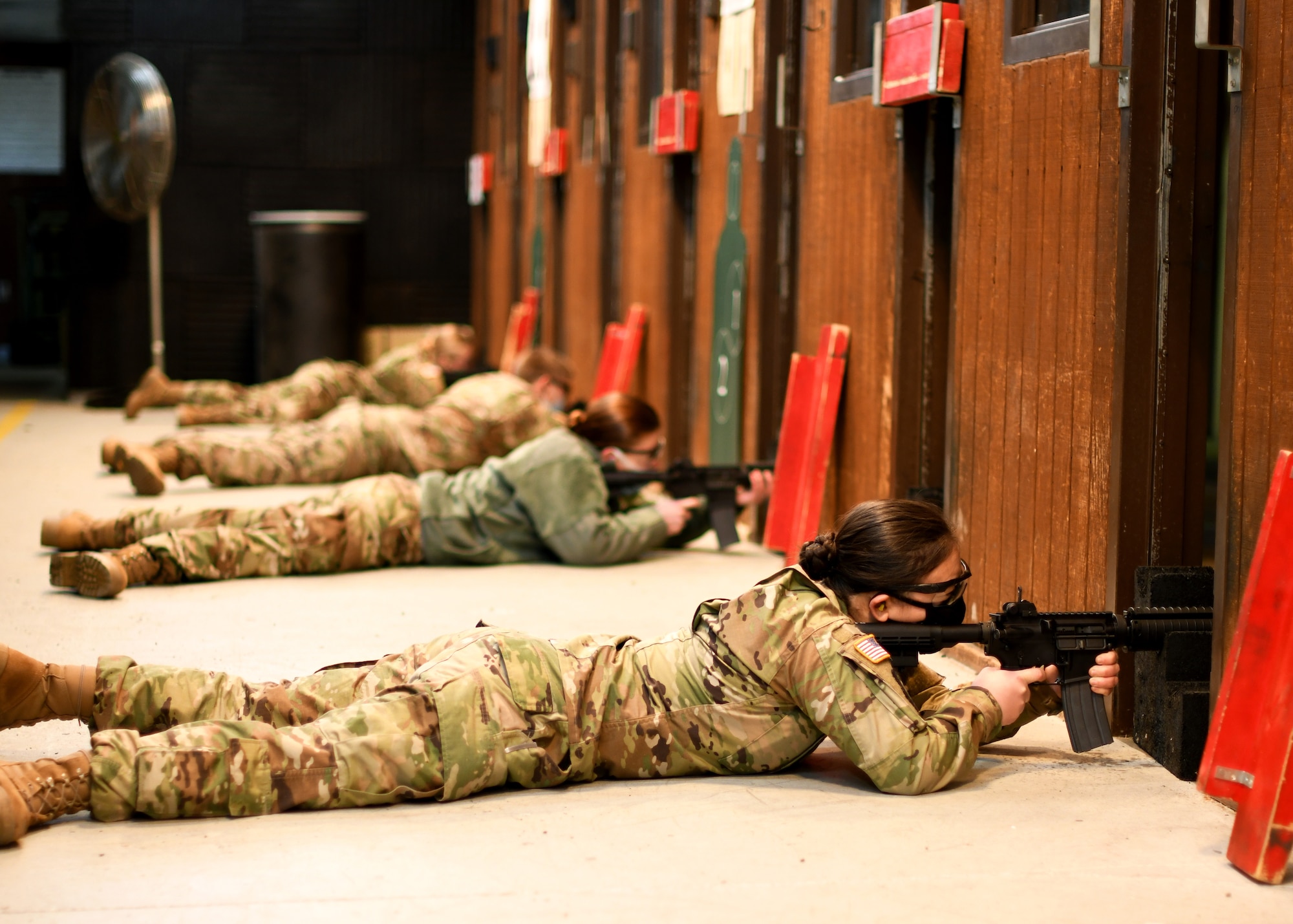 University of North Dakota Army Reserve Officer Training Corps cadets fire M4A1 carbines from the prone supported position during weapons familiarization training on Grand Forks Air Force Base, N.D., Oct. 24, 2020. The 319th Security Forces Squadron provided a full day of range access for the cadets to complete weapons training in order to maintain their annual training requirement. (U.S. Air Force photo by Staff Sgt. Patrick A. Wyatt)