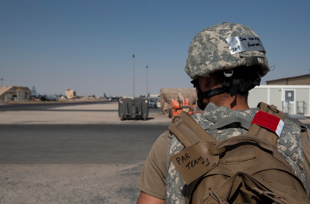 U.S. Air Force Senior Airman Hunter Ware, 5th Expeditionary Aircraft Maintenance Squadron C-17 Globemaster III aircraft integrated flight control systems technician, scans the area for simulated unexploded ordnances during Exercise Nodal Lightning 20-2