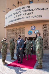 201028-N-IO414-1020 NAVAL SUPPORT ACTIVITY BAHRAIN (Oct. 28, 2020) Vice Adm. Samuel Paparo, commander of U.S. Naval Forces Central Command (NAVCENT), U.S. 5th Fleet and Combined Maritime Forces, walks with Secretary of Defense Dr. Mark T. Esper during a visit to the NAVCENT headquarters on board Naval Support Activity Bahrain, Oct. 28 . NAVCENT is the U.S. Navy element of U.S. Central Command in the U.S. 5th Fleet area of operations and encompasses about 2.5 million square miles of water area and includes the Arabian Gulf, Gulf of Oman, Red Sea and parts of the Indian Ocean. The expanse is comprised of 20 countries and includes three critical choke points at the Strait of Hormuz, the Suez Canal and the Strait of Bab al Mandeb at the southern tip of Yemen. (U.S. Navy photo by Mass Communication Specialist 2nd Class Jordan Crouch)