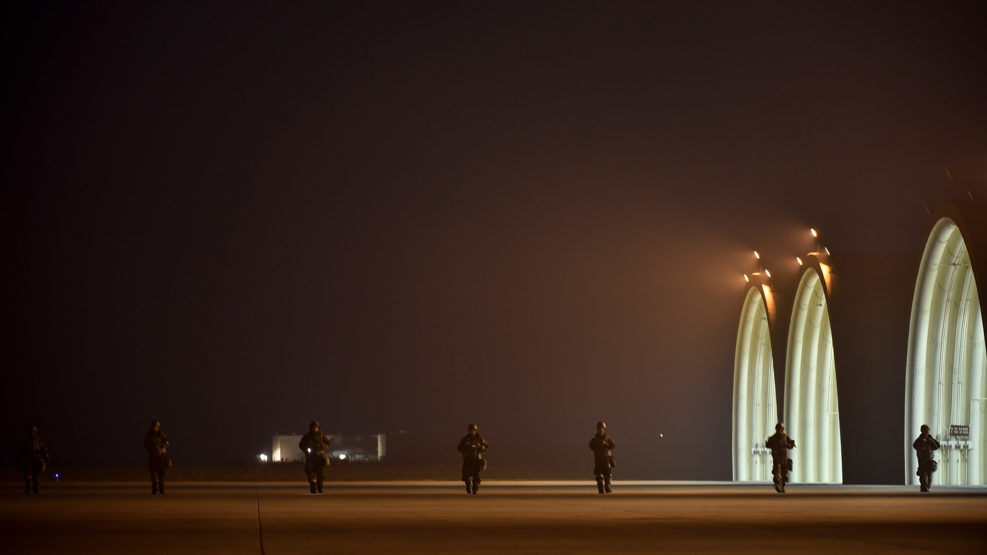 Airmen checking for debris.