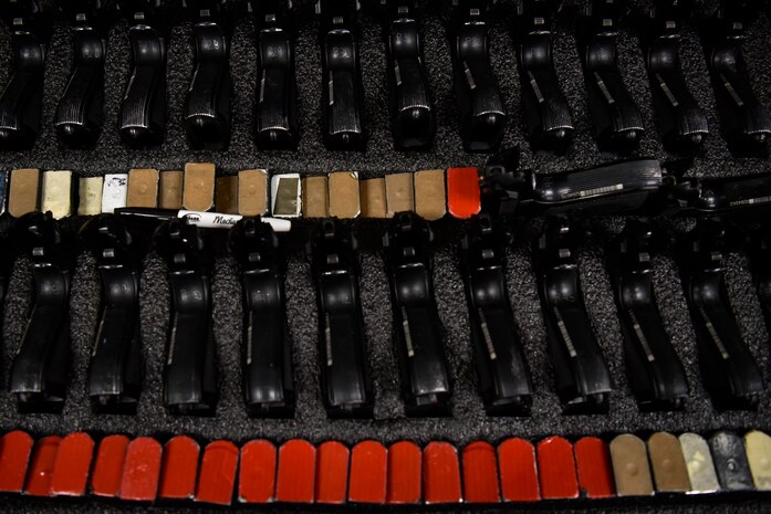 M-9 Berettas being stored in an aircrew flight equipment shop.