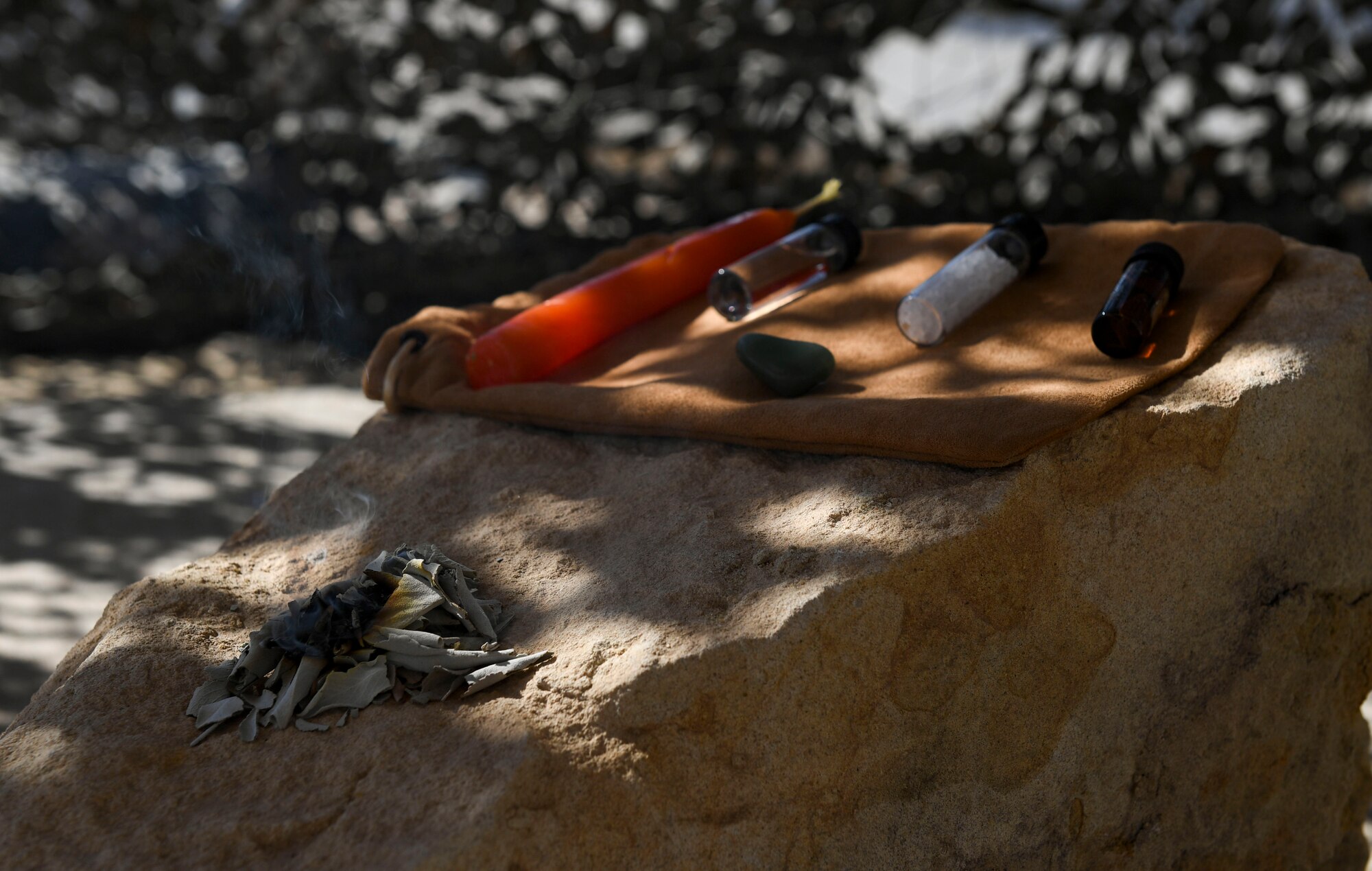 Items used for an Earth-based faith are placed on a rock in a newly built sacred space at Ali Al Salem Air Base, Kuwait, Oct. 26, 2020.