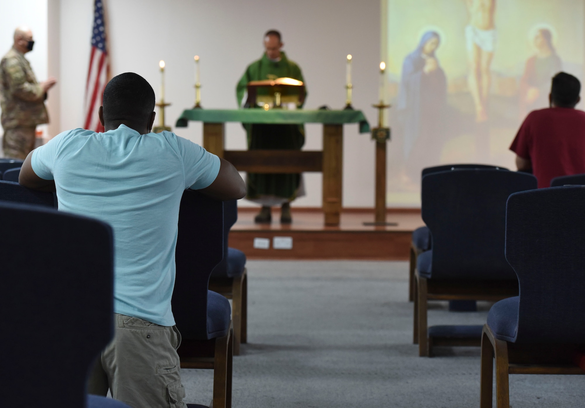 Chapel attendees pray during a Catholic service at Ali Al Salem Air Base, Kuwait, Oct. 26, 2020.