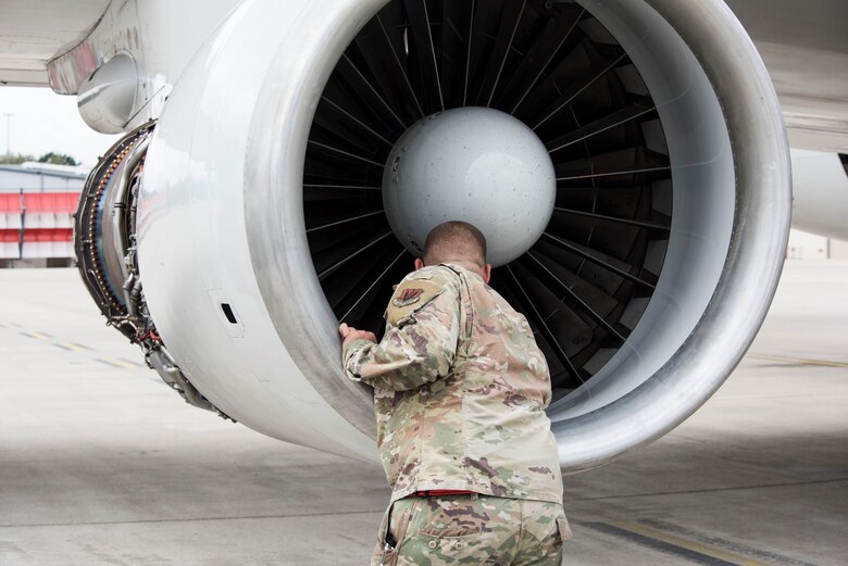 Photo of Airman working on a plane.