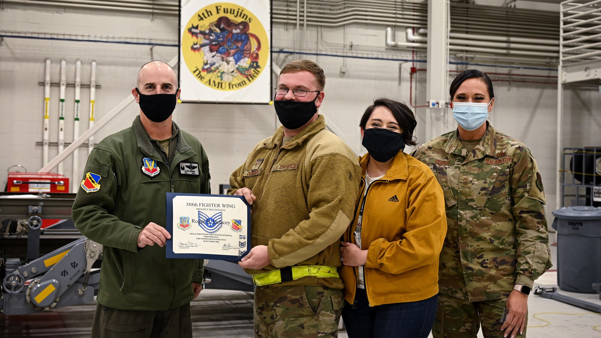 A photo of a STEP promotion to technical sergeant for Staff Sgt. Roger Delacy.