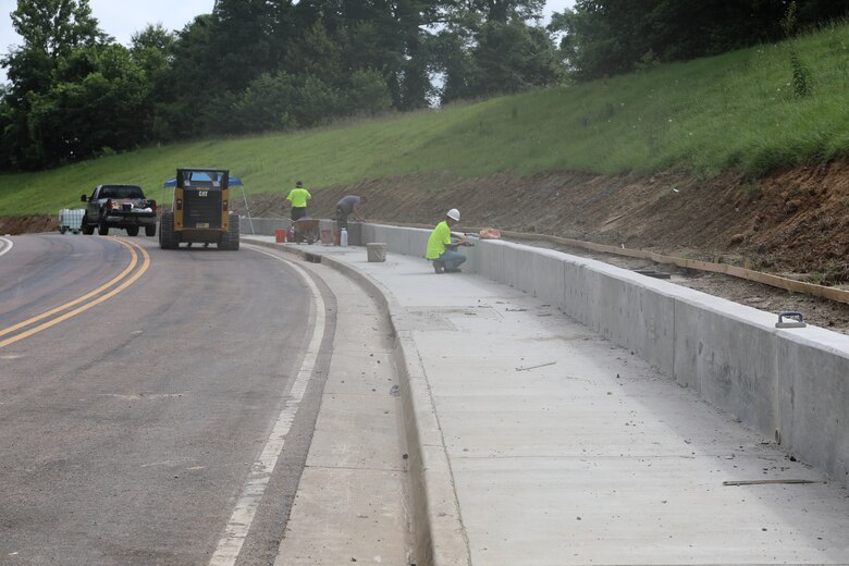 Contractors work build a new sidewalk near the Information Technology Laboratory at the U.S. Army Engineer Research and Development Center (ERDC) in Vicksburg, Miss. in September 2020. The work is part of the ERDC Master Plan, developed by the Installation Operations Division with a goal of enhancing quality of life and safety on all ERDC properties.