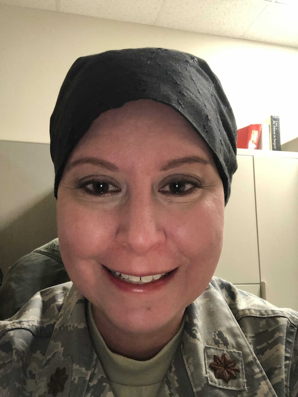 U.S. Air Force Maj. Jessica Brooks pauses for a selfie amidst her chemotherapy phase, Feb. 13, 2019.