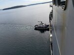 The Navy’s first Yard Tug (YT) 808 class tug recently delivered to Naval Base Kitsap, Bremerton Annex.  Only 17 days after delivery, YT 808 was in the water assisting USNS Richard Byrd (T-AKE 4) as it moved away from the dock at Naval Magazine Indian Island.