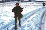 Mary Lohnes, on patrol during a winter exercise while an Active Guard Reservist with Nebraska Army National Guard. She is now a master sergeant in the Missouri Air National Guard's 139th Airlift Wing Communications Flight.